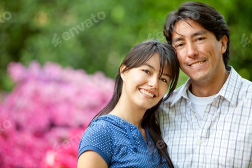 Preview: Couple Portrait Looking Happy And Smiling Outdoors