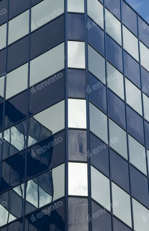 Preview: Section Of Reflective Skyscraper In Morning Light