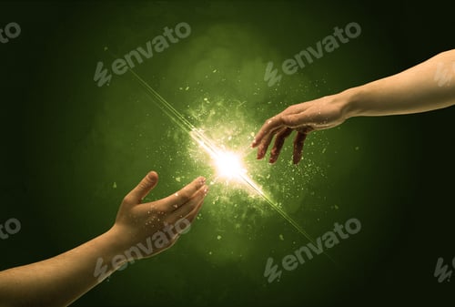 Preview: Two Naked Male Hands About To Touch, Lighting The Spark With Modest Explosion In Front Of Green