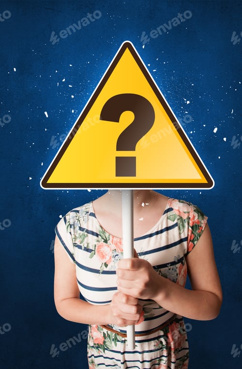 Preview: Casual Young Woman Holding Yellow Sign With Question Mark