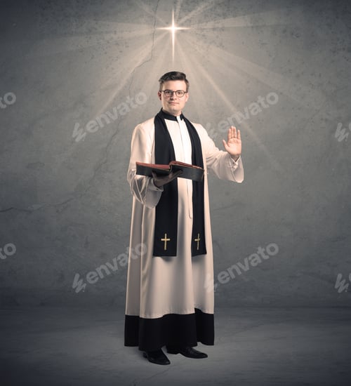 Preview: A Young Male Priest In Black And White Giving His Blessing In Front Of Grey Wall With Glowing Cross