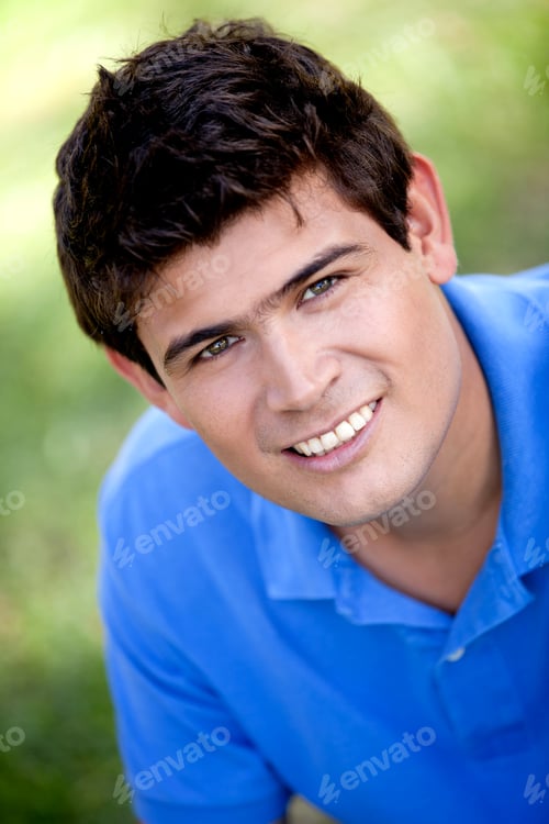 Preview: Portrait Of A Casual Man Smiling Outdoors