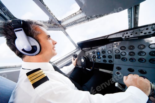 Visualização: Male Pilot Sitting In The Cabin And Flying An Airplane
