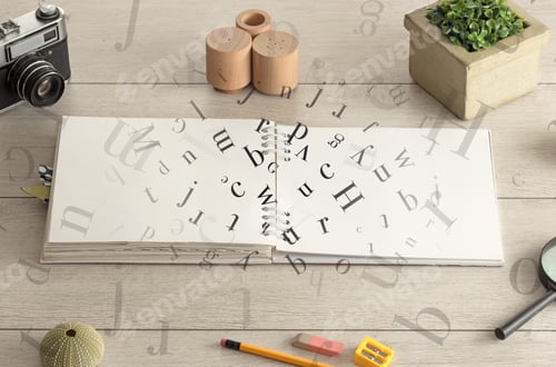 Preview: Open Notebook On The Floor With Office Instruments Nearby And Letters On It