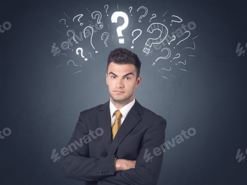 Preview: Young Businessman With White Question Marks Above His Head