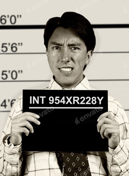 Preview: Mugshot Of An Annoyed Male Prisoner