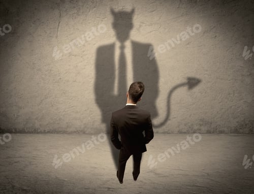 Preview: An Experienced Tricky Businessman In Suit Looking At His Devil Desguise Shadow Reflected On The