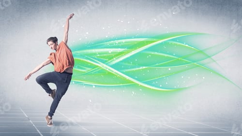 Preview: A Good Looking Fresh Street Dancer Dancing In Front Of Grey Background With White And Bright