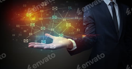 Preview: Elegant Businessman Holding Communication Concept On His Hand