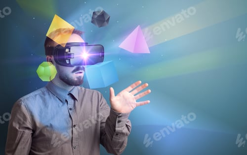 Preview: Amazed Businessman With Virtual Reality Colorful Geometric Shapes In Front Of Him
