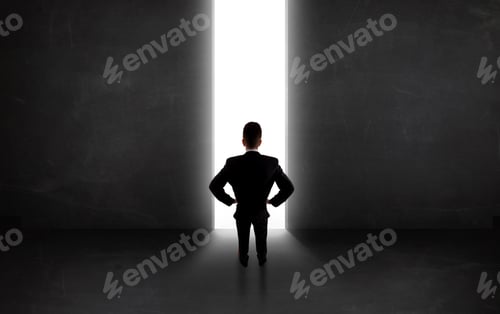 Preview: Business Person Looking At Wall With Light Tunnel Opening Concept