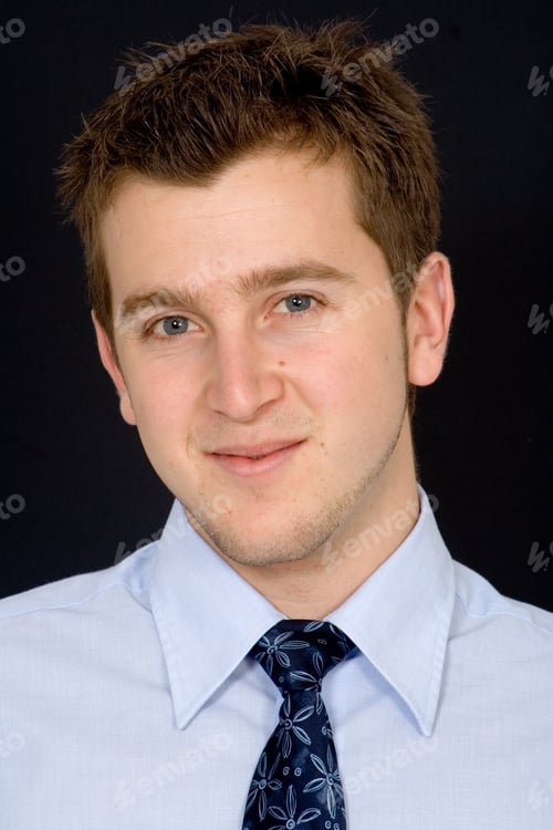 Preview: Business Man Portrait On A Dark Background