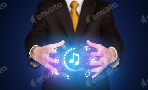 Preview: Businessman Holding Digital Multimedia Icons