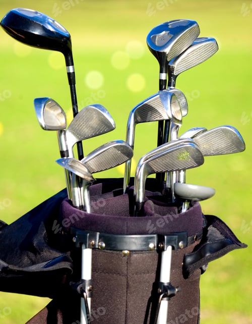 Preview: Golf Clubs In A Bag With A Course In The Background