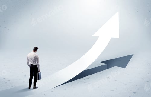 Preview: A Young Adult Salesman Standing In Front Of A Big Arrow Pointing Up With A Shadow In Grey Empty
