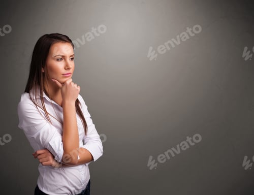 Vista previa: Beautiful Young Woman Thinking With Empty Copy Space