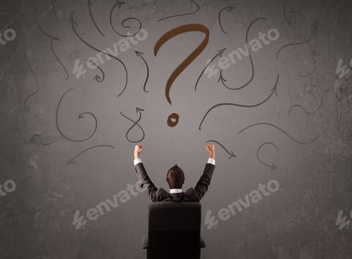 Preview: Business Man Looking At Question Mark Sketch On The Wall