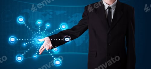 Preview: Young Businessman Pressing Virtual Messaging Type Of Icons