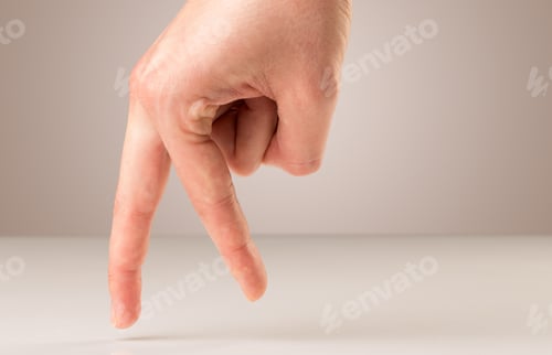 Preview: Female Fingers Walking On White Surface