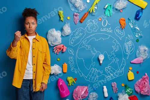 Preview: Ecology Protection And Volunteering Concept. Angry Afro American Woman Shows Fist With Negative
