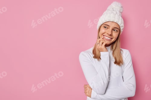 Preview: Smiling Woman Wearing White Hat and Long Sleeve Shirt