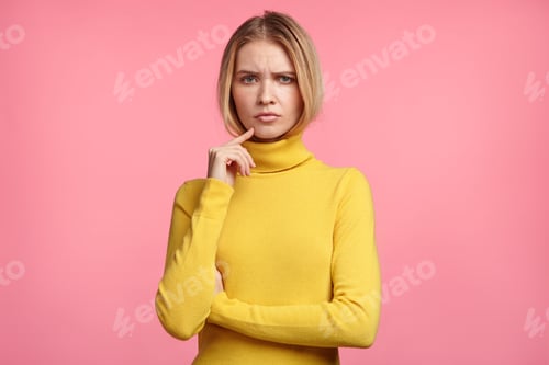 Preview: Sad Discontent Female Has Unhappy And Tired Look, Poses Against Pink Background, Being Fatigue