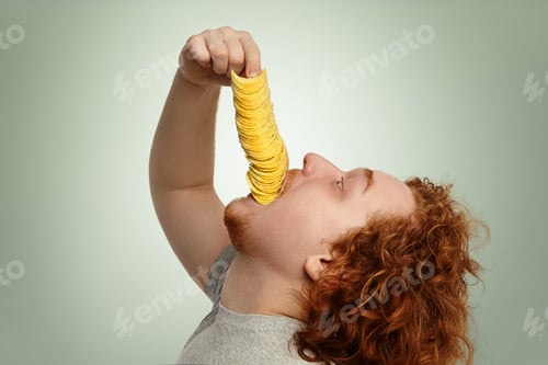 Preview: Never Enough. Profile Of Obese Caucasian Man With Ginger Hair Leaning Head Back, About To Gobble Up