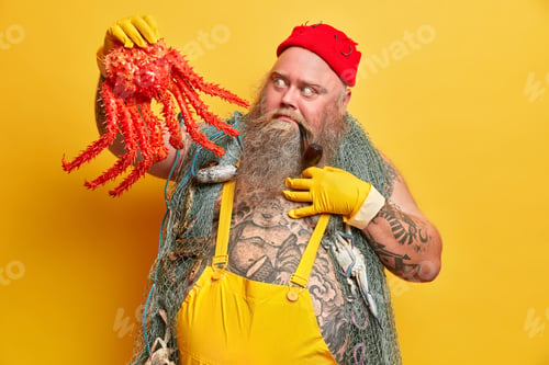 Preview: Photo Of Surprised Bearded Seaman Looks With Shocked Expression At Big Red Octopus Smokes Pipe