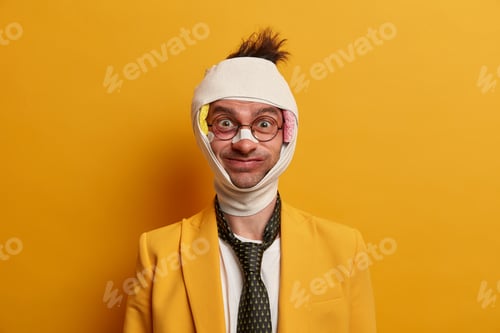 Preview: Young Funny Man Recovers From Rhinoplasty, Surgical Operation, Wrapped In Bandage, Wears Round