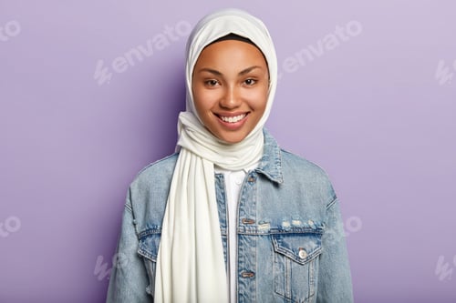 Preview: Smiling Woman in White Headscarf and Denim Jacket