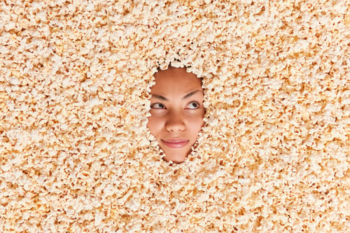 Preview: Serious Woman Focused Away Drowned In Popcorn While Watching Movie Eats Tasty Dessert Has Pensive