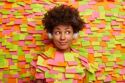 Preview: Beautiful Intelligent Female Student Learns Language Online, Listens Audio Track In Headphones