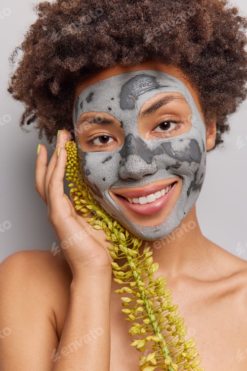 Preview: Woman With Clay Mask and Plant Stem