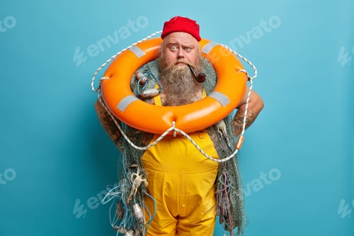 Preview: Experienced Sailor Carries Inflated Swim Ring And Smoking Pipe, Busy With Vessel Mainetnance