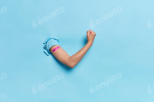 Preview: Immunization Procedure And Antivirus Campaign Concept. Unrecognizable Patient Shows Band Aid On