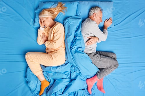 Preview: Above View Of Married Old Couple Sleep Deeply Lying Back To Each Other In Comfortable Bed Wear Soft