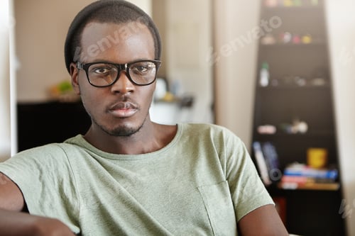 Preview: Man Wearing Beanie and Glasses Indoors