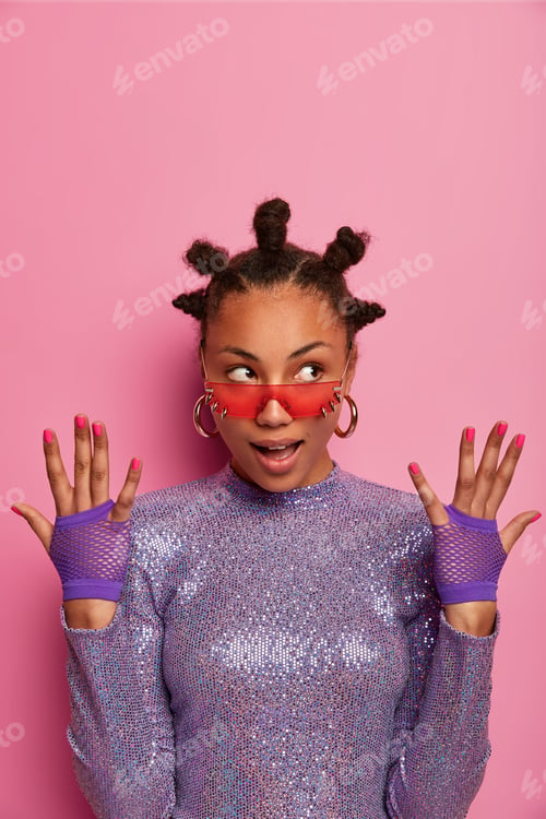 Preview: Confident Afro American Woman Raises Hands, Wears Sport Gloves, Looks Aside, Shows Manicure