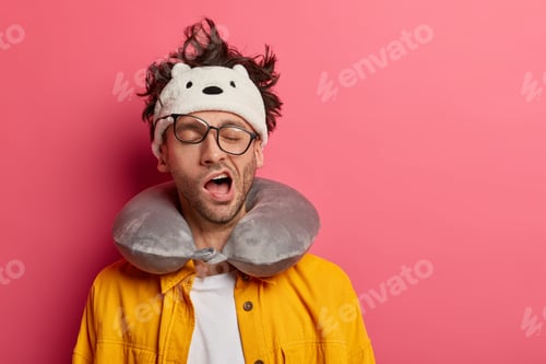 Vista previa: Tired Or Sick Male Passenger Yawns As Wants To Sleep, Has Sleepy Expression, Suffers From Insomnia