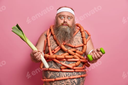 Preview: Puzzled Bearded Fatso Man Decides Whether To Eat Healthy Vegetable Or More Tasty Sausages, Goes In