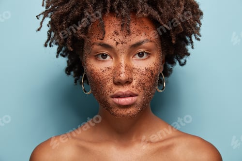 Preview: Skin Care And Cosmetology Concept. Beautiful Dark Skinned Serious Female Model Has Brown Coffee