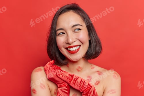 Preview: Happy Dreamy Young Asian Lady Concentrates Away With Toothy Smile Stands Bare Shoulders Has Kiss