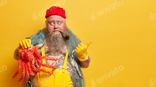 Preview: Serious Bearded Skilled Fisher Caught Octopus, Points Aside On Blank Space, Dressed In Red Hat And