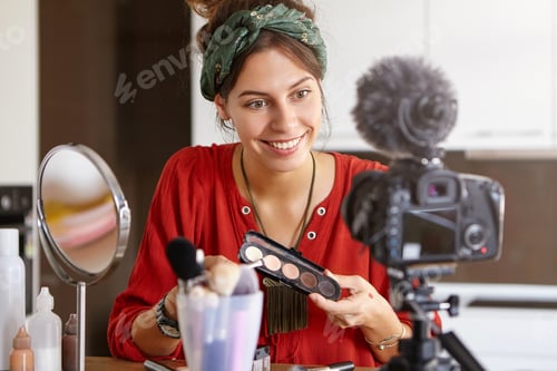 Preview: Cute Woman Recording Podcast, Presenting Eyeshades And Broadcasting Live Video To Social Network