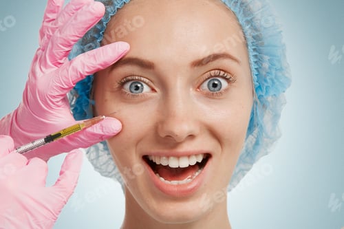 Preview: Reduction Of Wrinkles, Injection, Nasal Labial Folds. Portrait Of A White Woman During Surgery