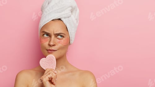 Preview: Beauty, Cosmetology Concept. Thoughtful Serious Woman With Healthy Skin, Wears Wrapped Towel, Anti