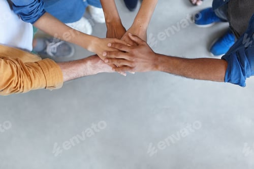 Preview: View From Above Of Group Of People Keeping Their Hands In Pile Expressing Social Friendship, Unity