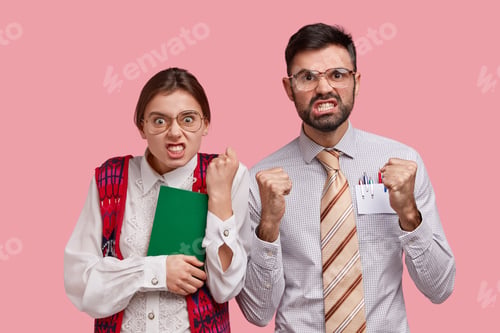 Preview: Outraged Woman And Man With Annoyed Expressions, Clench Fists And Teeth, Irritated To Have Much
