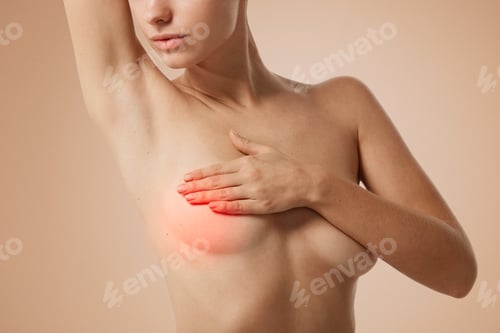 Preview: Closeup Cropped Portrait Young Woman With Breast Pain Touching Chest Colored Isolated On Background