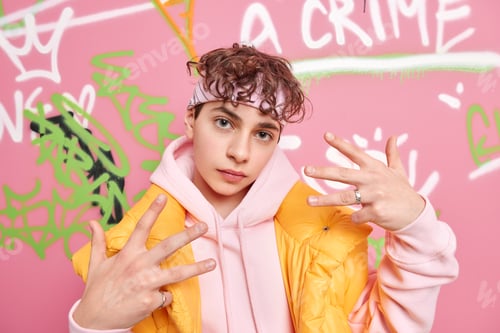 Preview: Self Confident Hooligan Youngster Makes Yo Gesture Feels Cool Wears Stylish Sweatshirt And Vest